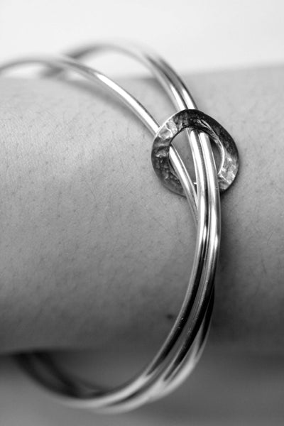 Three sterling silver bangles