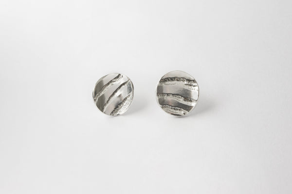 Oxidised silver concave textured striped small studs with gold