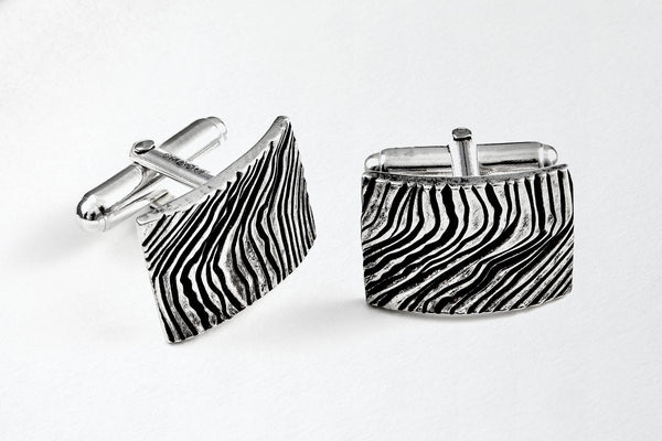 Oblong oxidized, textured silver cufflinks, hallmarked in Sheffield.