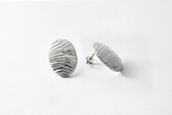 Oval striped textured silver stud earrings