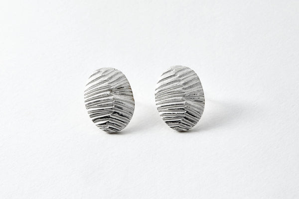 Oval striped textured silver stud earrings