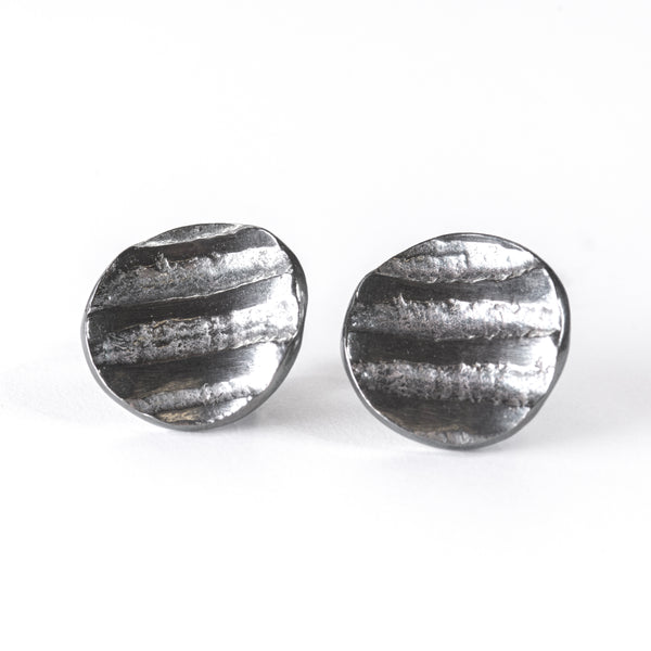 Oxidised silver concave textured striped small studs with gold